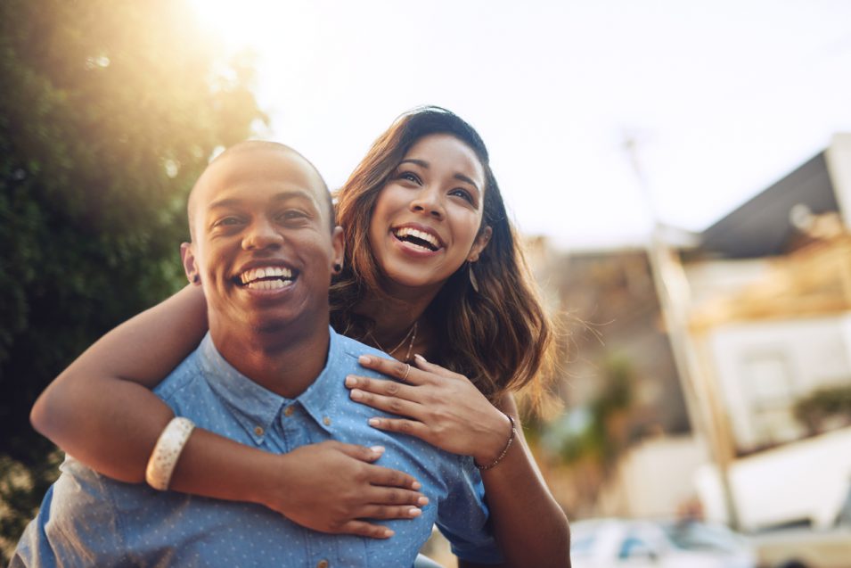 Cosmetic dentist gives dental service to young couple