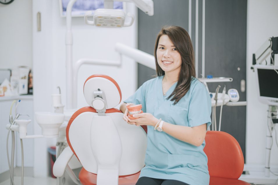 asian chinese dentist portrait in dentist's office