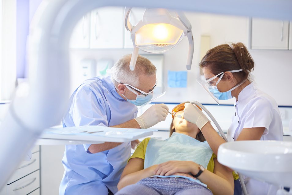 emergency dentists performing treatment in hamilton