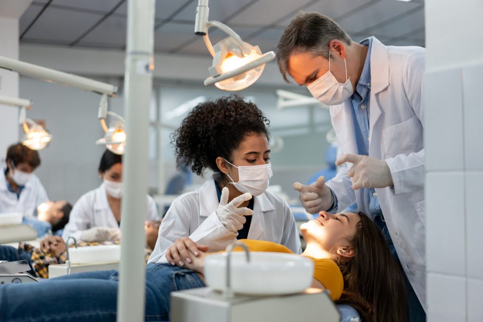 hamilton dentist examining oral disease