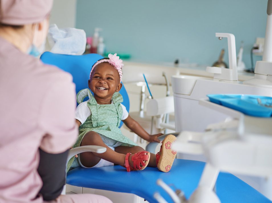 smiling girl at pediatric dentist in hamilton